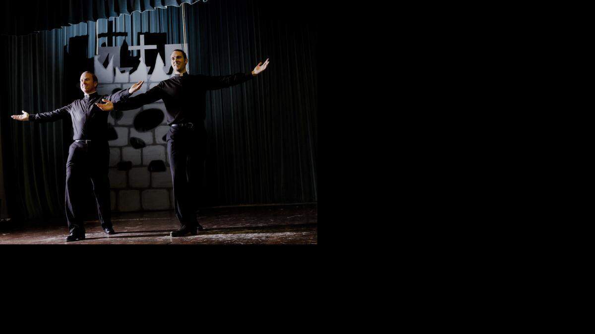 
In this Monday, Oct. 13, 2014, photo Father David Rider, left, and father John Gibson dance before an interview with the Associated Press at the Pontifical North American College in Rome. A video of the them duel-dancing while studying in Rome has gone viral.
