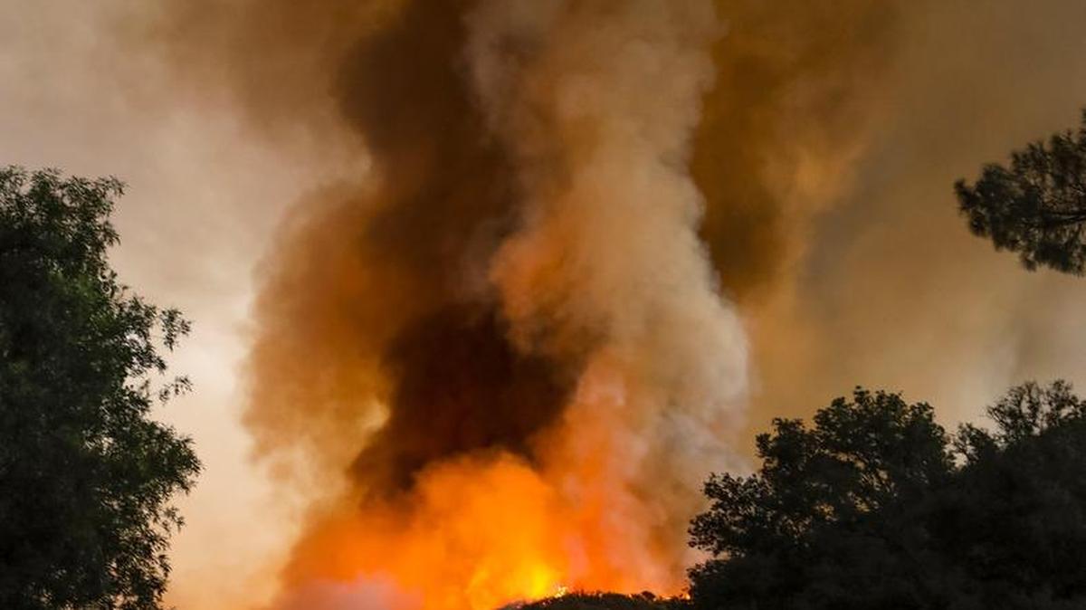 The Hill Fire continues to burn near Huer Huero Road in Santa Margarita, Calif., on Monday. Evacuation orders remain in place for sparsely populated rural areas of San Luis Obispo County due to a nearly 2-square-mile fire.