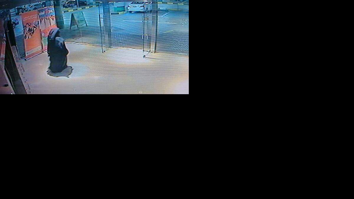 
This image made from video released by the Abu Dhabi police department on Tuesday, Dec. 2, 2014, shows a veiled suspect in the stabbing of an American teacher in a shopping mall restroom as seen on security camera footage in Abu Dhabi, United Arab Emirates. A statement posted on the Abu Dhabi Interior Ministry's website said the victim was stabbed Monday with a sharp tool that has been confiscated by police. Col. Rashid Borshid, head of the Criminal Investigation Department, said the attacker remains at large. He said police are investigating possible motives and the gender of the attacker. 
