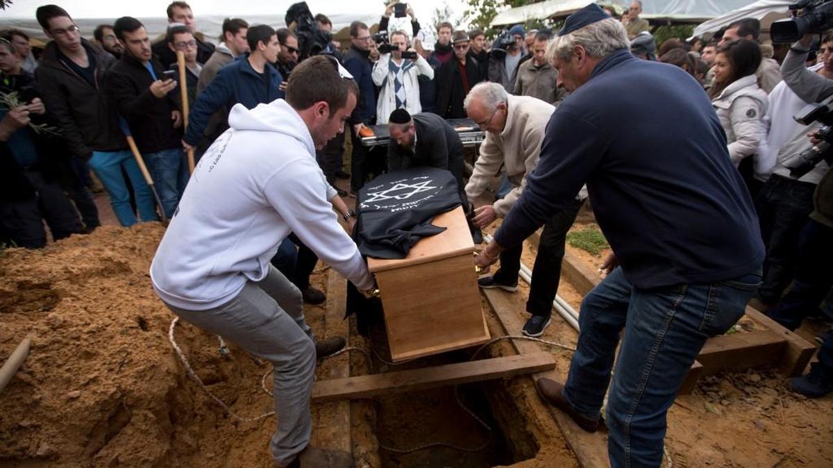 Friends and relatives of 93-year-old Samuel Willenberg, who was a Holocaust survivor, attend his funeral and burial in Udim in central Israel. The death of Willenberg marks the passing of the last witness to the notorious Nazi death camp of Treblinka.