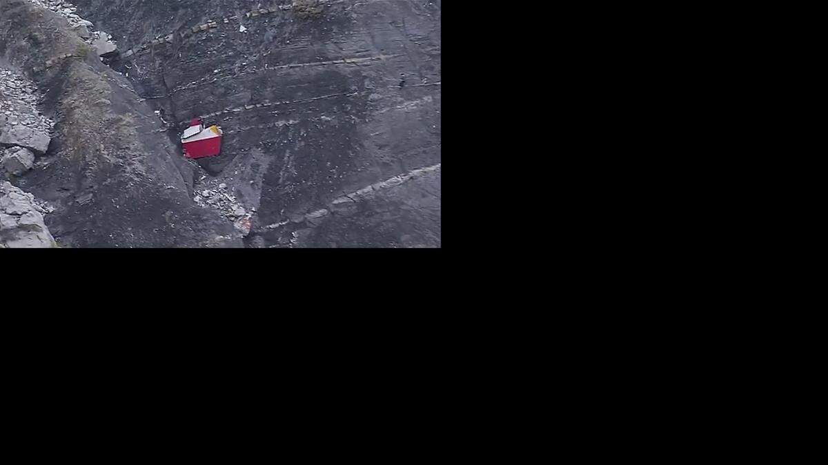 
Debris is scattered over the area after a Germanwings Airbus 320 crashed near Seyne-les-Alpes in the French Alps, Tuesday, killing all 150 people onboard.
