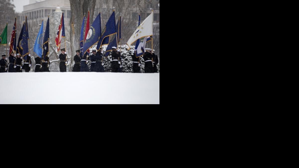 
Members on an honor guard prepare for the arrival of Mexican President Enrique Pena Nieto, Tuesday, at the White House.
