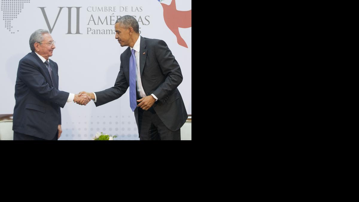 
President Obama and Cuban President Raul Castro shake hands during their meeting at the Summit of the Americas in Panama City, Panama, Saturday.
