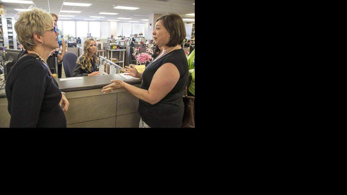 
Lesbian couple Donna DiTrani, left, and Kerry Wilks question Sedgwick County trial court supervisor Shalyn Taylor after being refused a marriage license at the Sedgwick County Courthouse in Wichita (Oct. 6, 2014)
