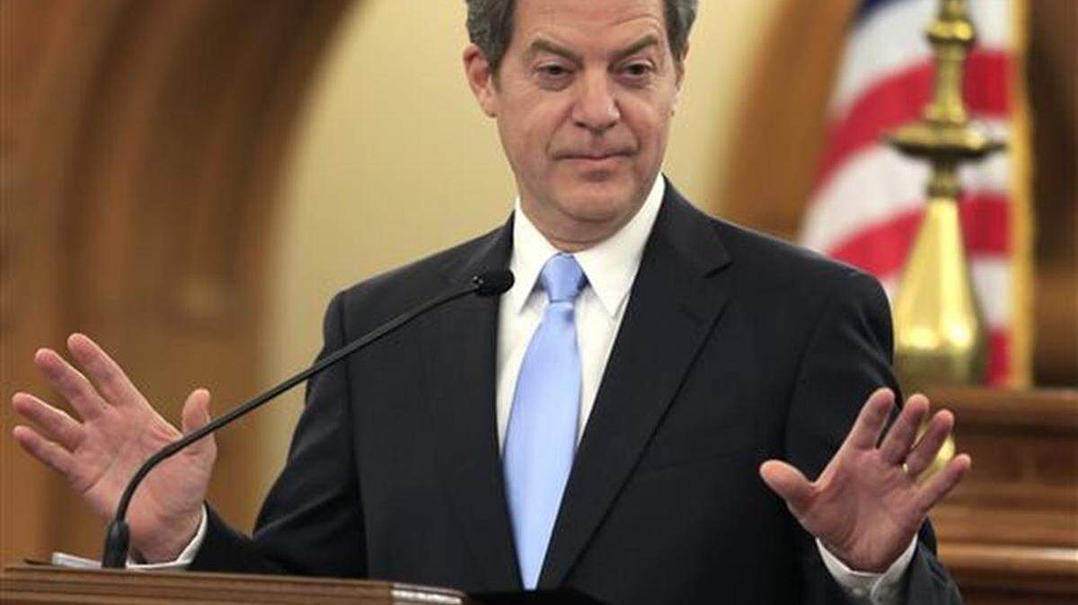Kansas Gov. Sam Brownback delivers his State of the State address to a joint session of the legislature in Topeka, Kan., Tuesday, Jan. 12, 2016.