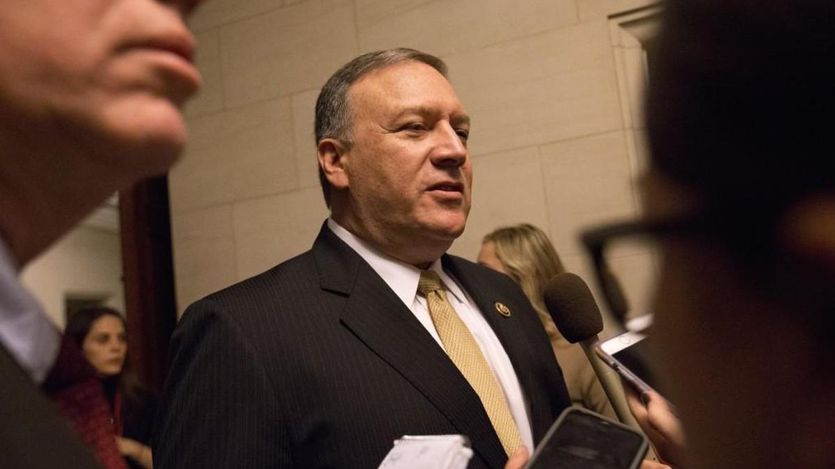 Rep. Mike Pompeo, R-Kansas, talks to reporters on Capitol Hill in Washington last year.