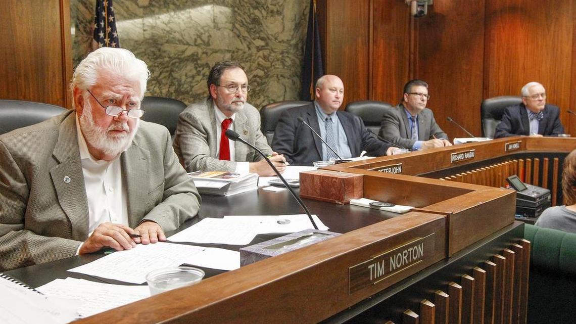 
Sedgwick County Commissioners, from left, Tim Norton, Karl Peterjohn, Richard Ranzau, Jim Howell and Dave Unruh, listen to public comments during a budget hearing. (Aug. 6, 2015) 