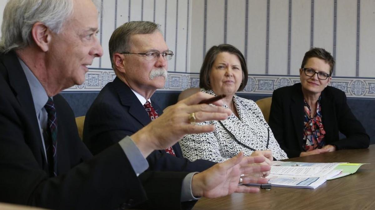 Kansas Supreme Court Chief Justice Lawton Nuss, second from left, and Justices Marla Luckert, second from right, and Carol Beier listen Monday to Sedgwick County District Court Chief Judge James Fleetwood discuss court workers’ low pay. (April 24, 2017)