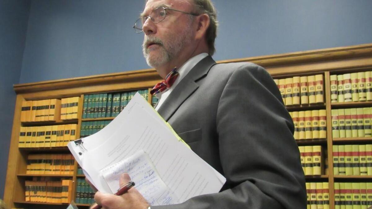Mark Johnson, an attorney for suspended voters, criticized the policy at Tuesday’s meeting.