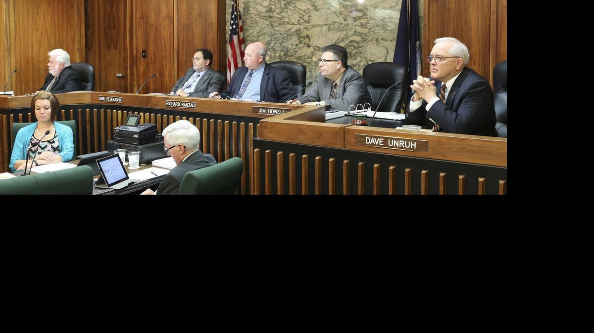 
Sedgwick County commissioners listen to public comments last month. The meeting was the first opportunity for residents to address all five commissioners in person on the $412.3 million recommended budget. Commissioners are sharply divided over the budget’s major goals, such as the county’s shift to paying for roads projects with cash. The recommended budget includes cuts to economic development coalitions, nonprofits, the health department and cultural organizations, as well as reshaped county commitments to the Sedgwick County Zoo and Exploration Place. (July 29, 2015)