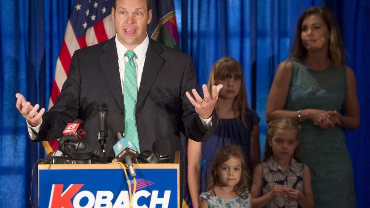 Surrounded by his family, Kris Kobach announces Thursday that he will run for governor of Kansas.