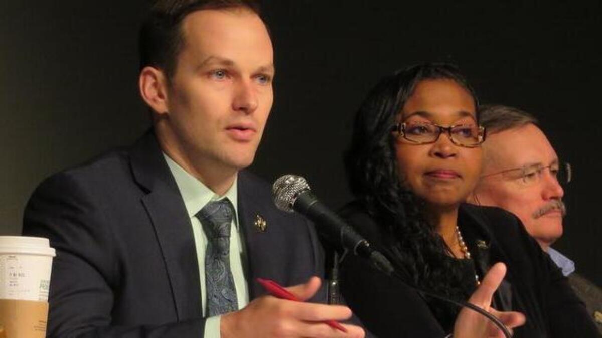 Rep. Brandon Whipple, left, at a legislative forum with Sen. Oletha Faust-Goudeau and Rep. John Carmichael.