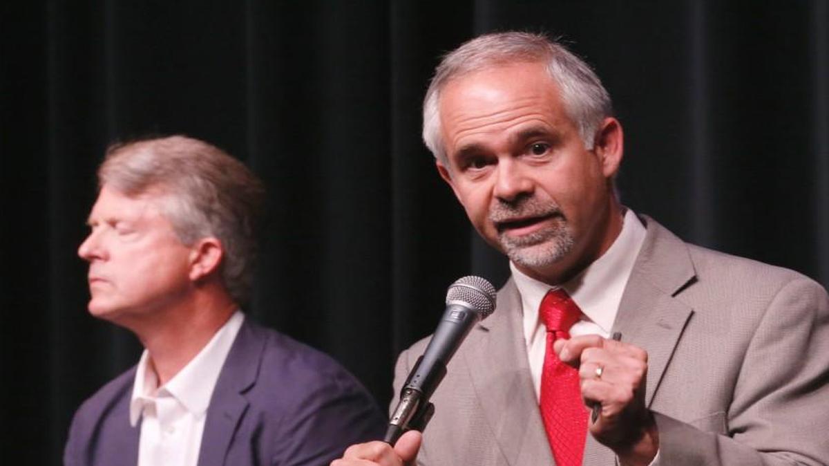 Tim Huelskamp, right, debates challenger Roger Marshall in June. Huelskamp lost his seat in Congress to Marshall in the Aug. 2 Republican primary. Although his days in Congress are numbered, Huelskamp isn’t surrendering to the role of lame duck.