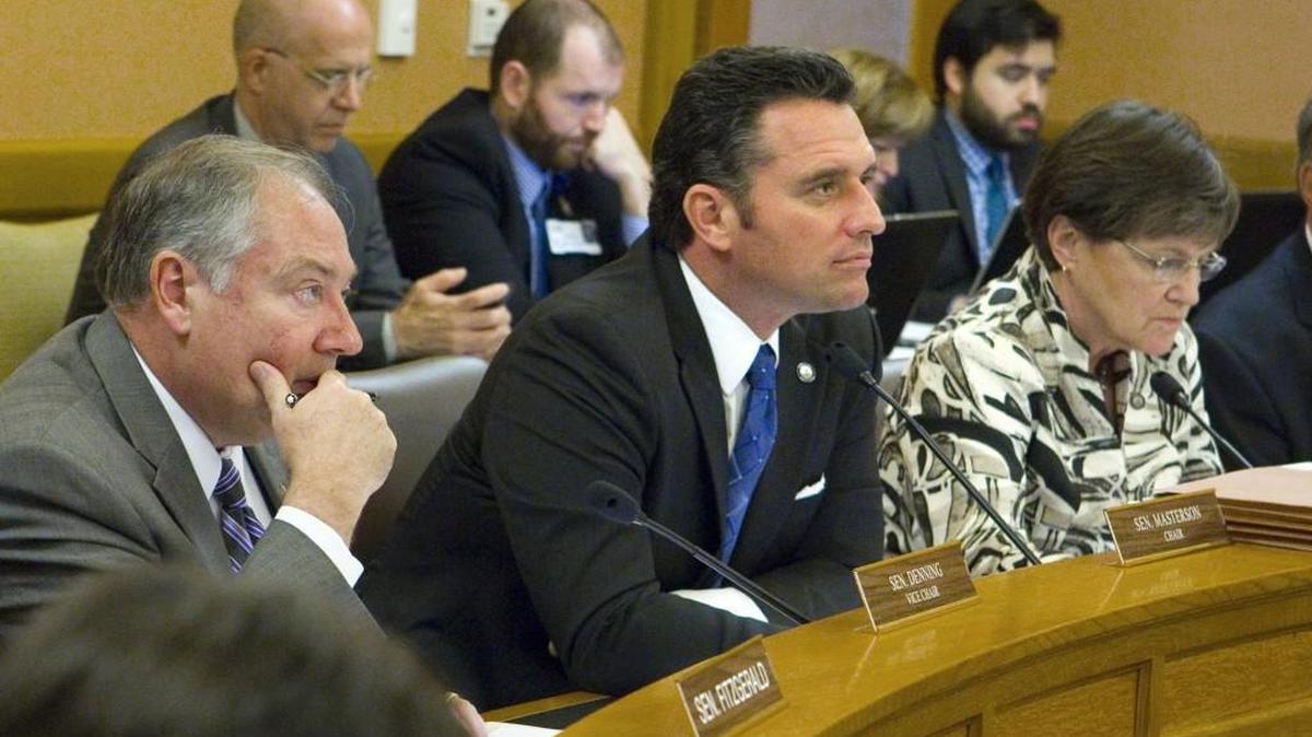Members of the Senate budget committee, including, Sen. Jim Denning, R-Overland Park, left, Sen. Ty Masterson, R-Andover, committee chairman, and Sen. Laura Kelly, D-Topeka, at a hearing last year. (May 18, 2015)