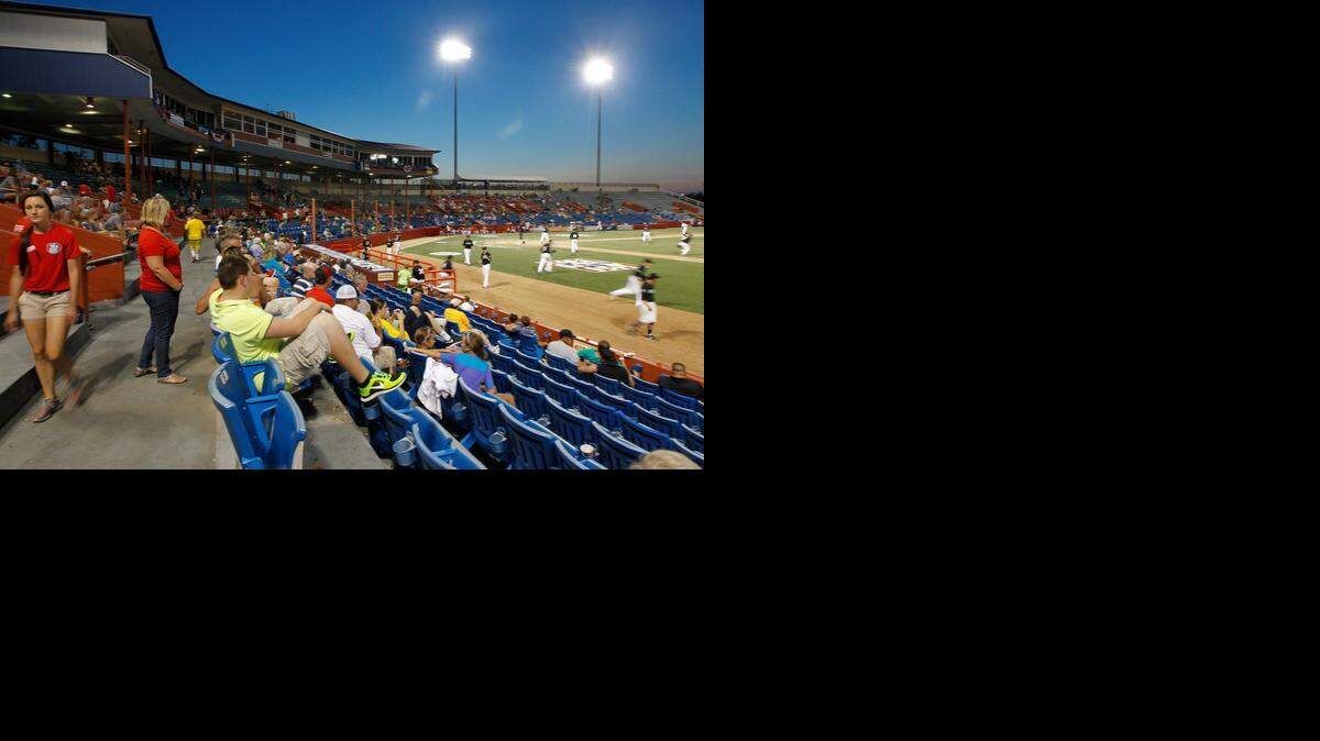 
Fans watch a game during the National Baseball Congress World Series at Lawrence-Dumont Stadium in August. 
