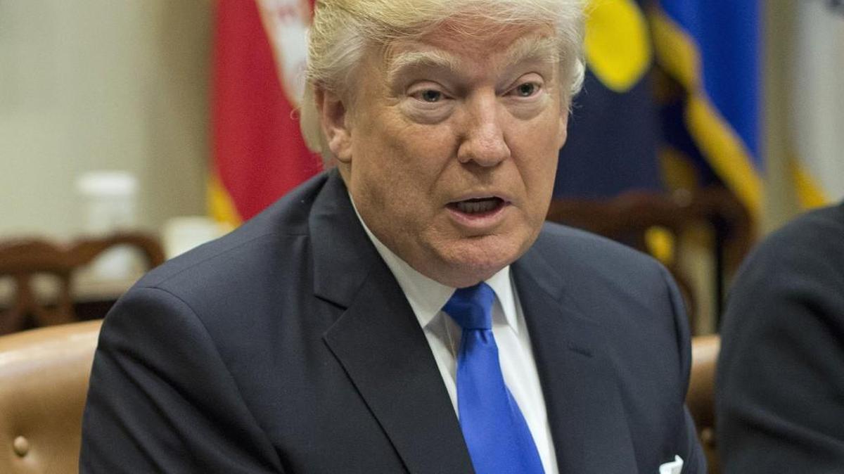 President Donald Trump speaks during his meeting with automobile leaders at the White House in Washington on Tuesday.