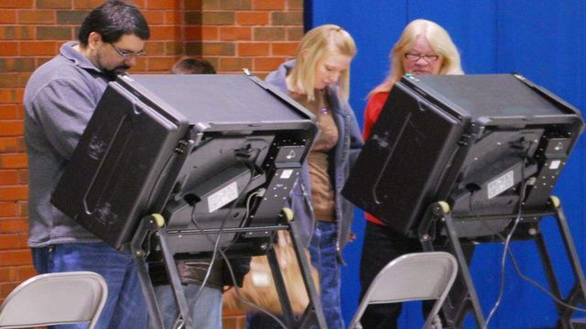 
People vote on machines at the Linwood Recreation Center.
