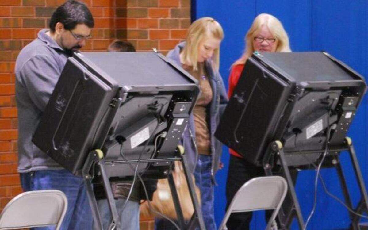
People vote on machines at the Linwood Recreation Center.
