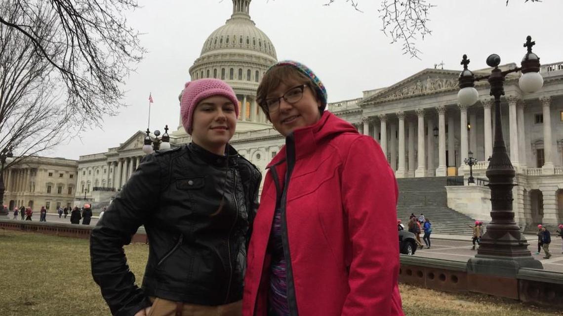 Jerusha Lofland, right, and her daughter, Melissa, came to the Capitol on a chartered bus from Wichita to participate in Saturday’s Women’s March following Friday’s inauguration of Donald Trump as president.