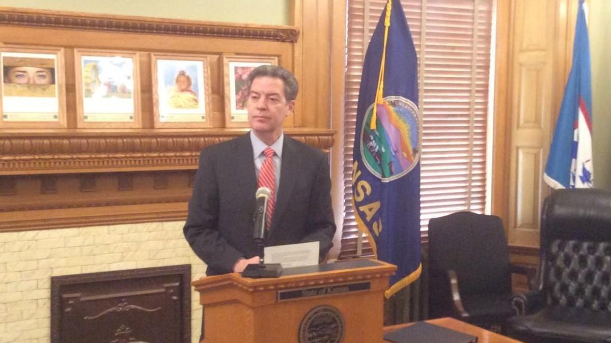 Gov. Sam Brownback at a veto-signing ceremony on Feb. 22, 2017, in the Kansas Statehouse.