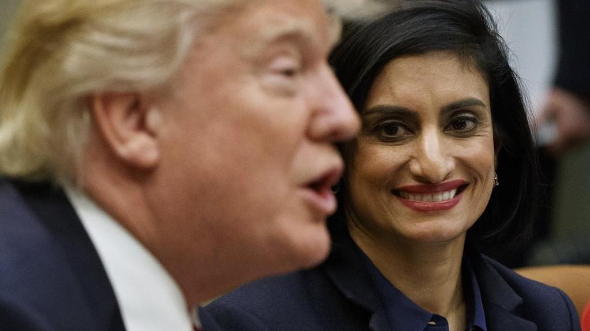 Administrator of the Centers for Medicare and Medicaid Services Seema Verma, right, listen as President Trump speaks during a meeting in the Roosevelt Room of the White House in Washington in March.