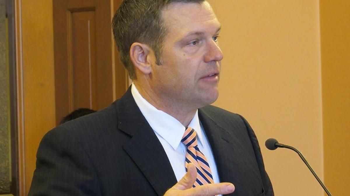 Secretary of State Kris Kobach testifies before the House Elections Committee on Wednesday.