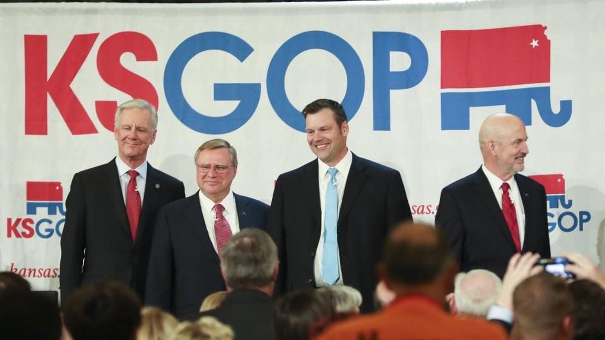 From left, Wink Hartman, Mark Hutton, Kris Kobach and Ken Selzer are introduced to the crowd during the inaugural Republican gubernatorial debate hosted by the Kansas Republican Party at the Wichita Hyatt Regency. (Feb. 17, 2018)