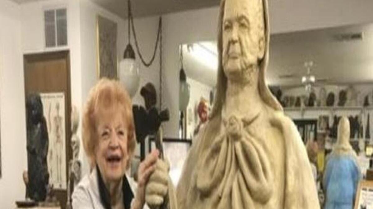 Artist Babs Mellor with her sculpture of radical prohibitionist Carry Nation. The statue is life-size. Nation stood about six feet tall and weighed about 175 pounds.