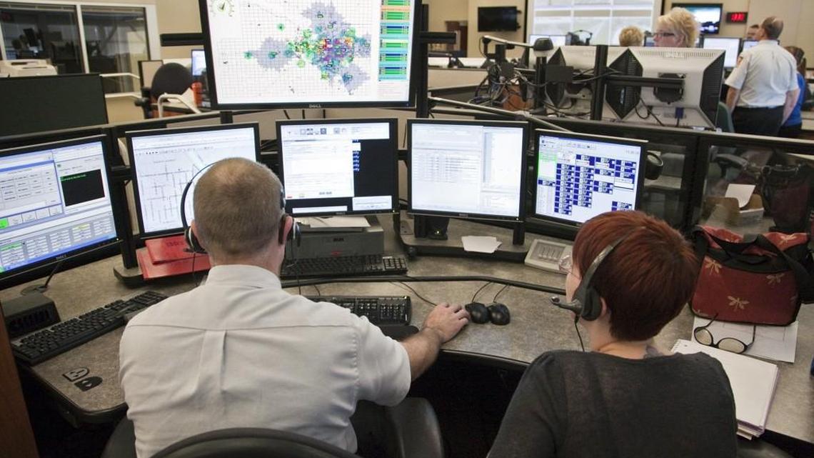 (FILE PHOTO) Sedgwick County 911 dispatchers work in the call center in 2012.