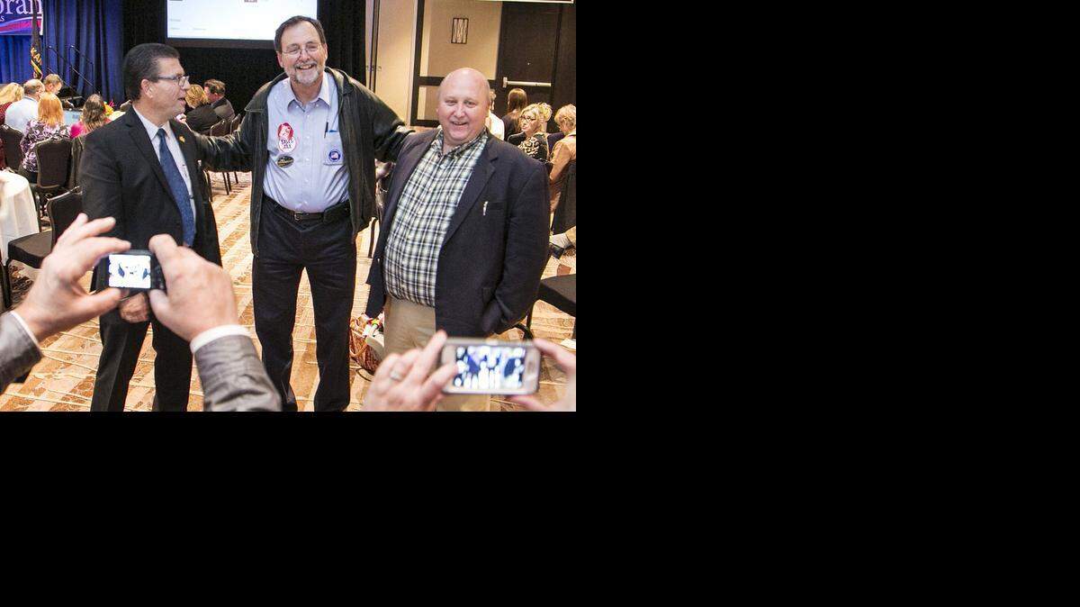 
The new majority on the Sedgwick County Commission set a new tone Wednesday for how it will approach government’s role in the community it serves. The new majority is Jim Howell, left, Karl Peterjohn and Richard Ranzau, shown here at the Sedgwick County Republican Party election watch party last year. (Nov. 4, 2014)
