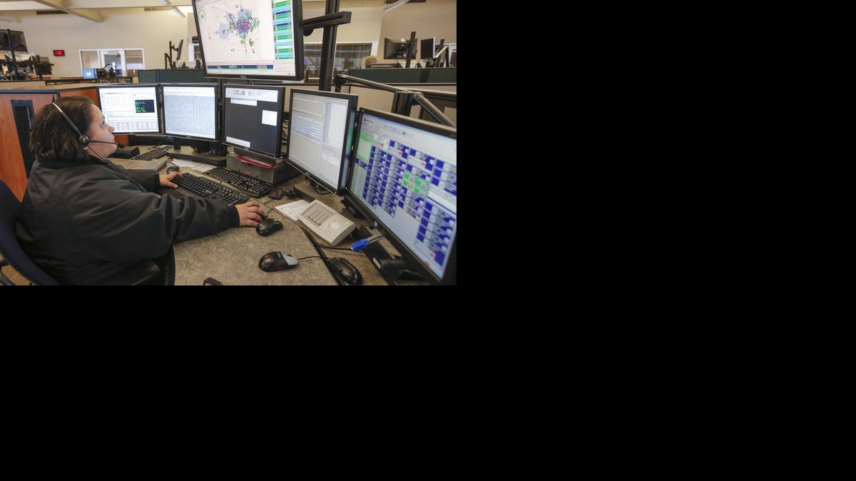 
A Sedgwick County 911 operator works in Wichita’s downtown public safety building.

