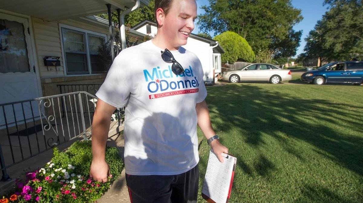 Michael O’Donnell, who is running for the Sedgwick County Commission, campaigns in a south Wichita neighborhood on Sept. 28.