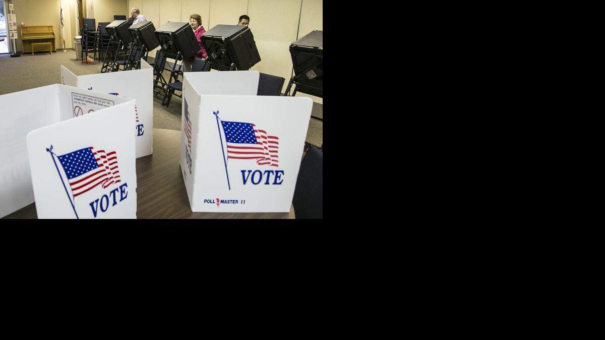 
Voters cast their ballots at Gloria Dei Lutheran Church in Riverside. (March 3, 2015) 
