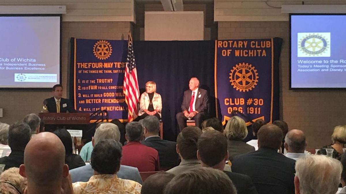 The two candidates vying for the District 3 seat on the Sedgwick County Commission, Marcey Gregory, center, and David Dennis, right, answer questions Monday at a Rotary Club forum for candidates. (Sept. 19, 2016)