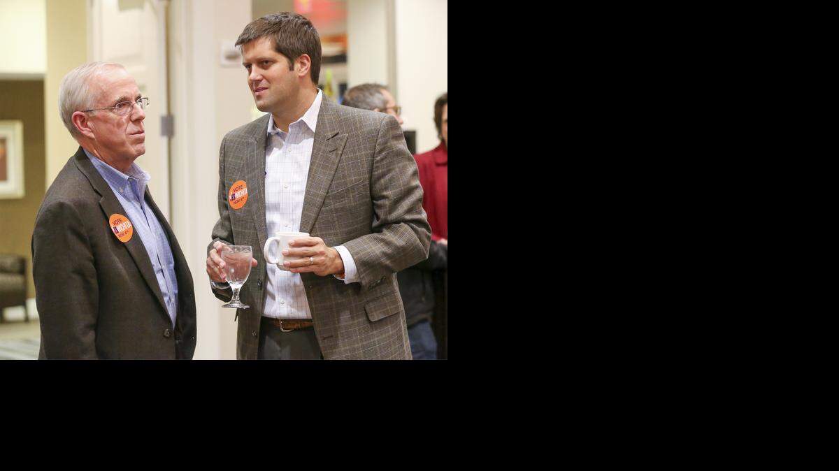 
Vote Yes chairman Jon Rolph talks with Intrust Bank CEO Charlie Chandler, left, during the Vote Yes election watch party at the Hyatt on Tuesday. (Nov. 4, 2014)
