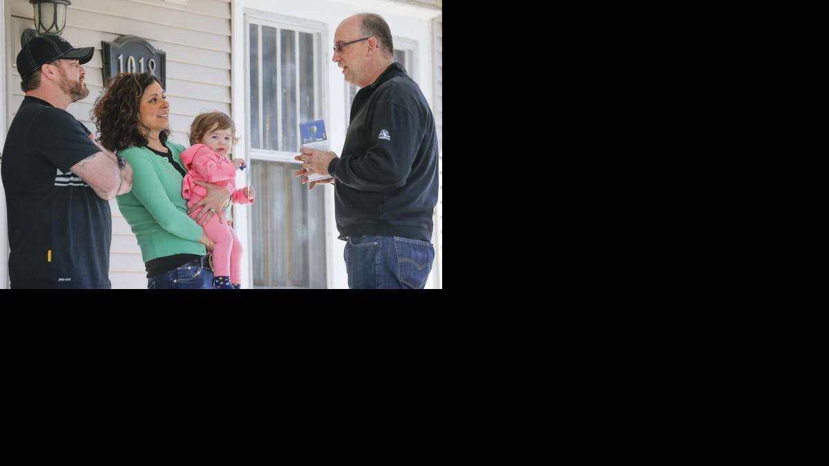 
Mayoral candidate Jeff Longwell visits with the Coats family, Todd, Christin and their daughter Eva, while campaigning in Riverside on a recent Saturday afternoon.
