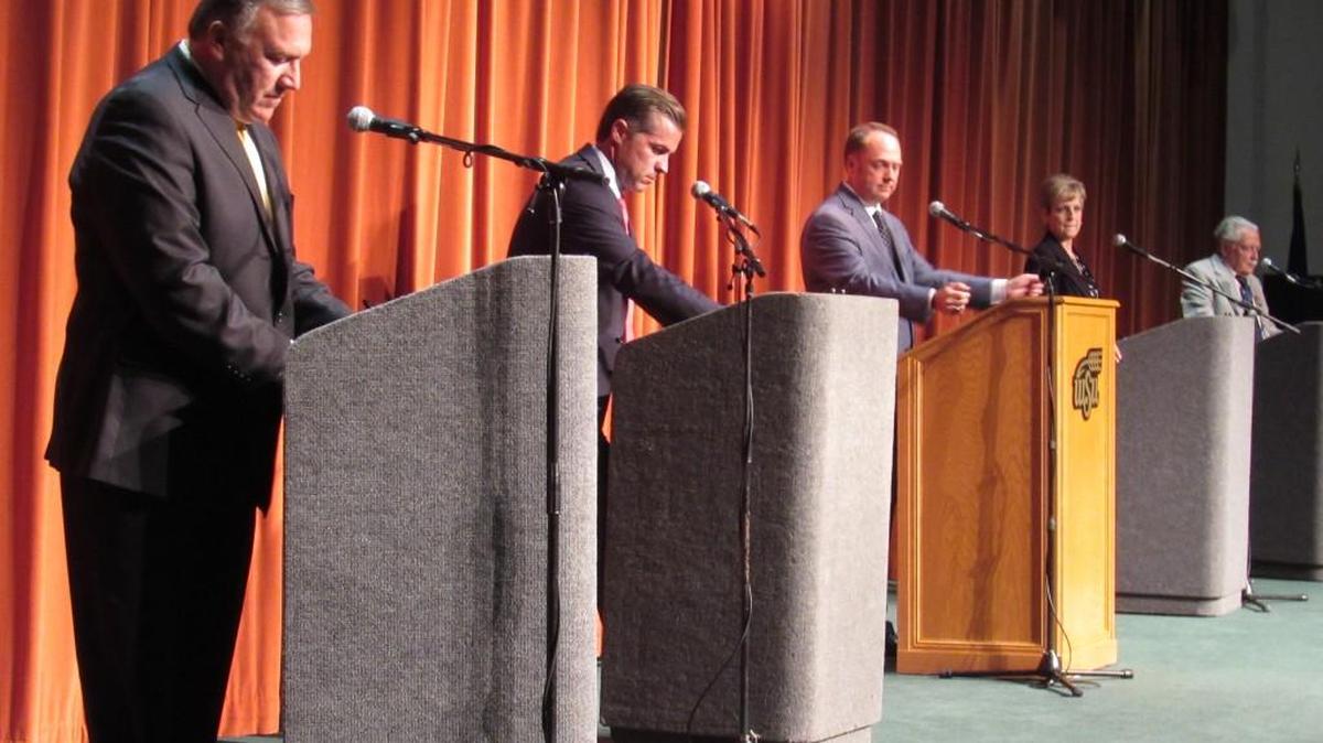 The four candidates for Kansas’ 4th District congressional seat meet Monday night in what is so far the only scheduled debate in the race. From left are Rep. Mike Pompeo, Democrat Dan Giroux, debate moderator Tim Brown, independent candidate Miranda Allen and Libertarian Gordon Bakken.