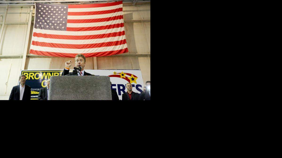 
Sen. Rand Paul (R-Ky.) speaks during a rally at Jabara Airport. He was there to support Gov. Sam Brownback and U.S. Sen. Pat Roberts. (October 28, 2014)
