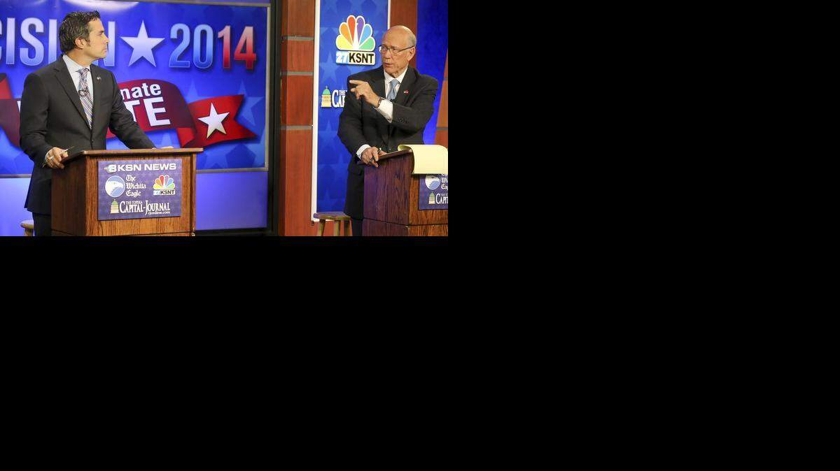 
Senate independent candidate Greg Orman, left, and Republican Sen. Pat Roberts square off during their debate Wednesday at the KSN studio in Wichita. (Oct. 15, 2014)

