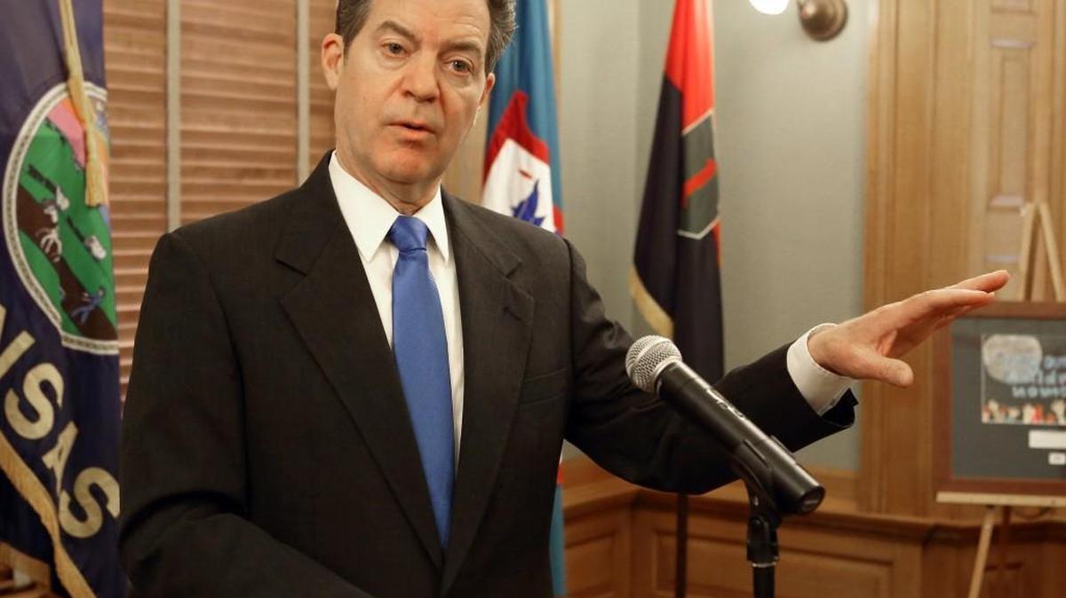 Gov. Sam Brownback during a news conference in Topeka earlier this year.