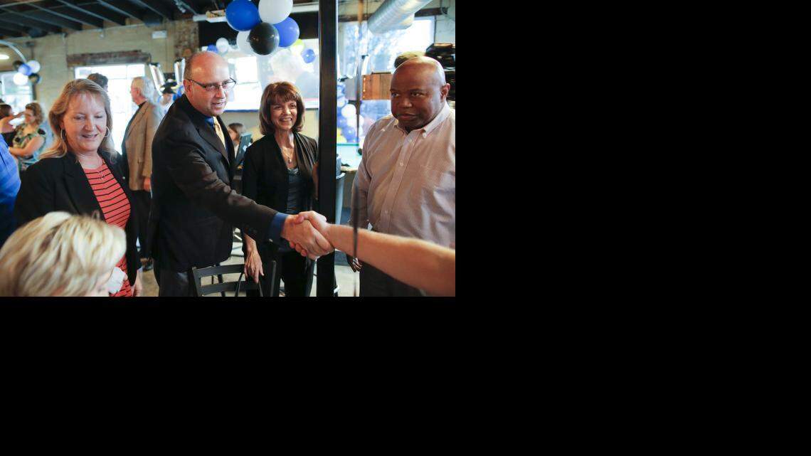 
Wichita Mayoral candidate Jeff Longwell greets supporters shortly after arriving at his election watch party at The Monarch in the Delano neighborhood on Tuesday. Early returns showed Longwell with a sizable lead over Sam Williams 
