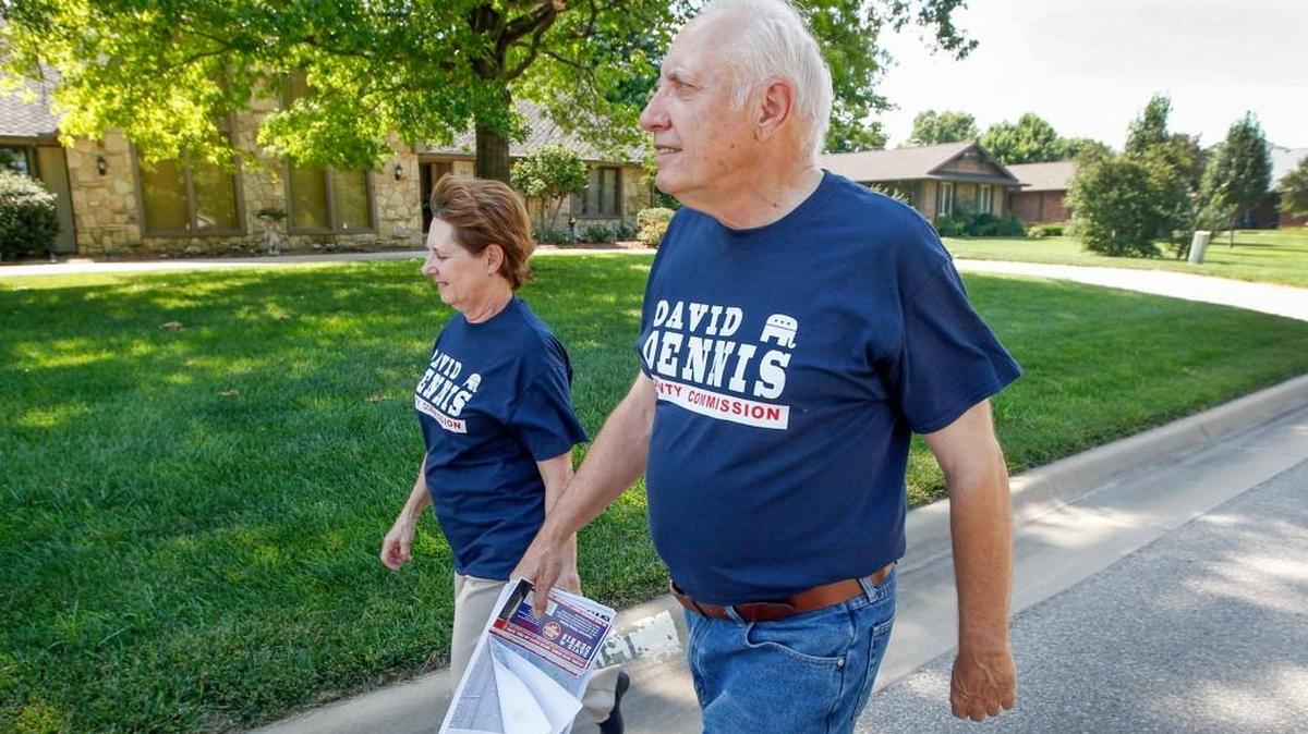 David Dennis and his wife, Janet, campaign in his neighborhood in west Wichita. (June 25, 2016)