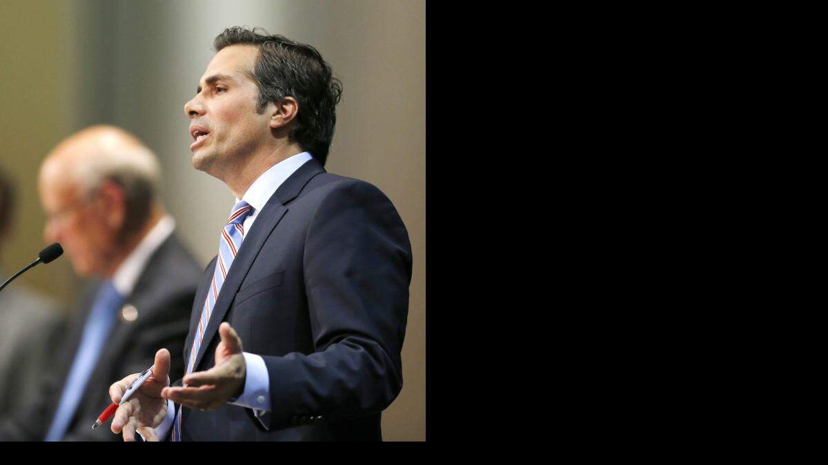 
Independent candidate for U.S. Senate Greg Orman, right, answers a question during a debate with U.S. Sen. Pat Roberts, R-Kan., left, in Overland Park on Oct. 8, 2014. 
