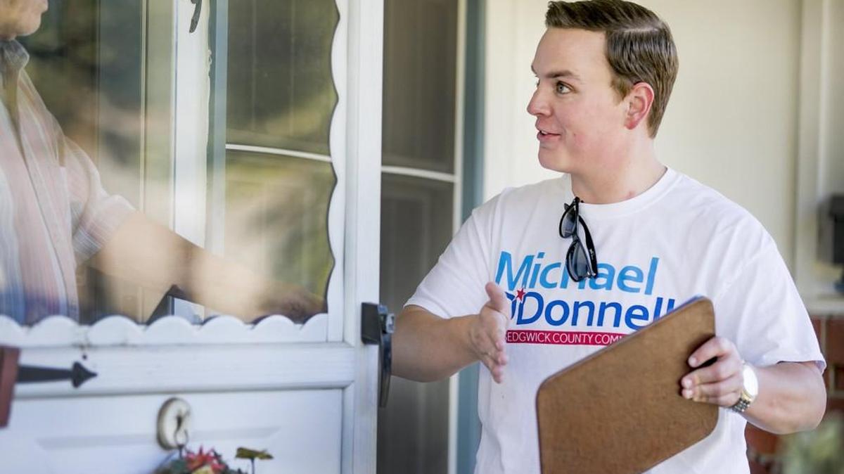 Michael O’Donnell, who is running for the Sedgwick County Commission, campaigns in a south Wichita neighborhood. (Sept. 28, 2016)