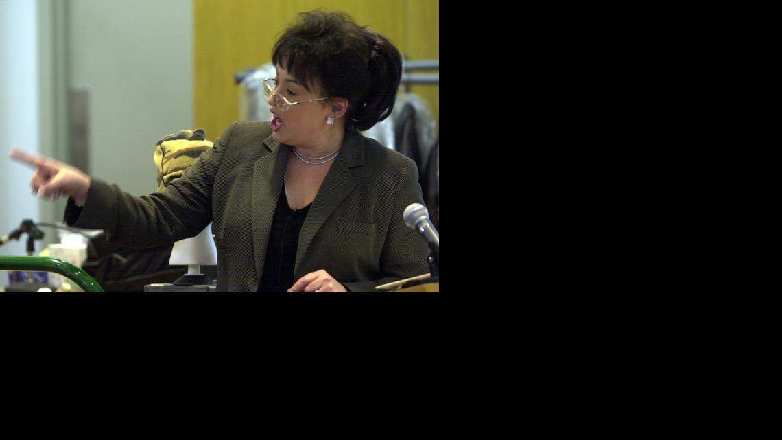 
District Attorney Nola Foulston points to the defendents, Jonathan and Reginald Carr, during her closing statement in the 2002 murder trial.
