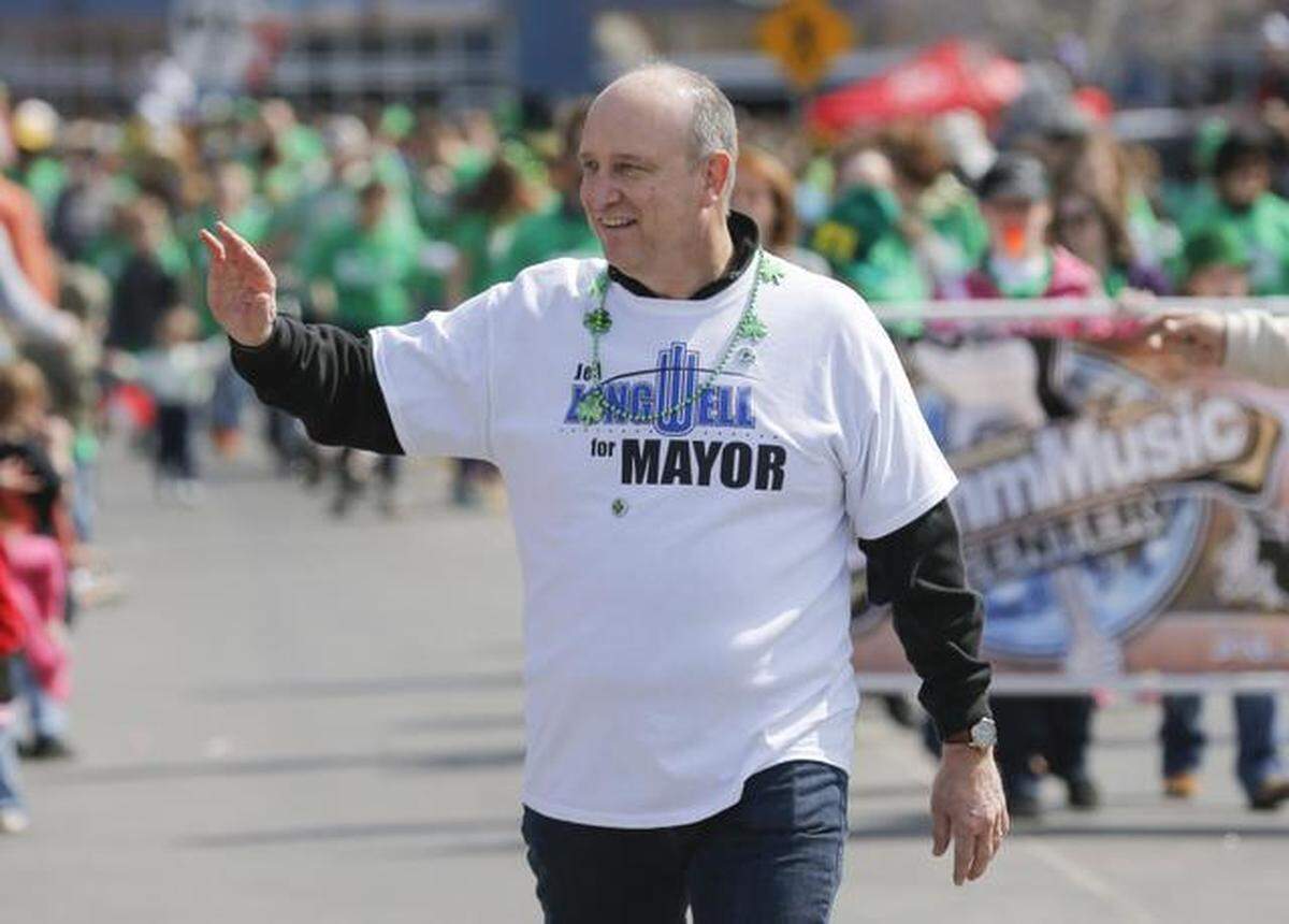 Mayoral candidate Jeff Longwell takes part in the St. Patrick’s Day parade in Delano on March 14.