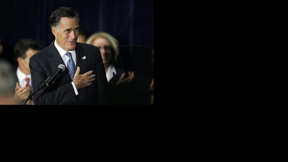 
Former Massachusetts Gov. and 2012 Republican presidential candidate Mitt Romney campaigns for Michigan Senate candidate Terri Lynn Land during a rally in Livonia, Mich., earlier this month. (Oct. 2, 2014)
