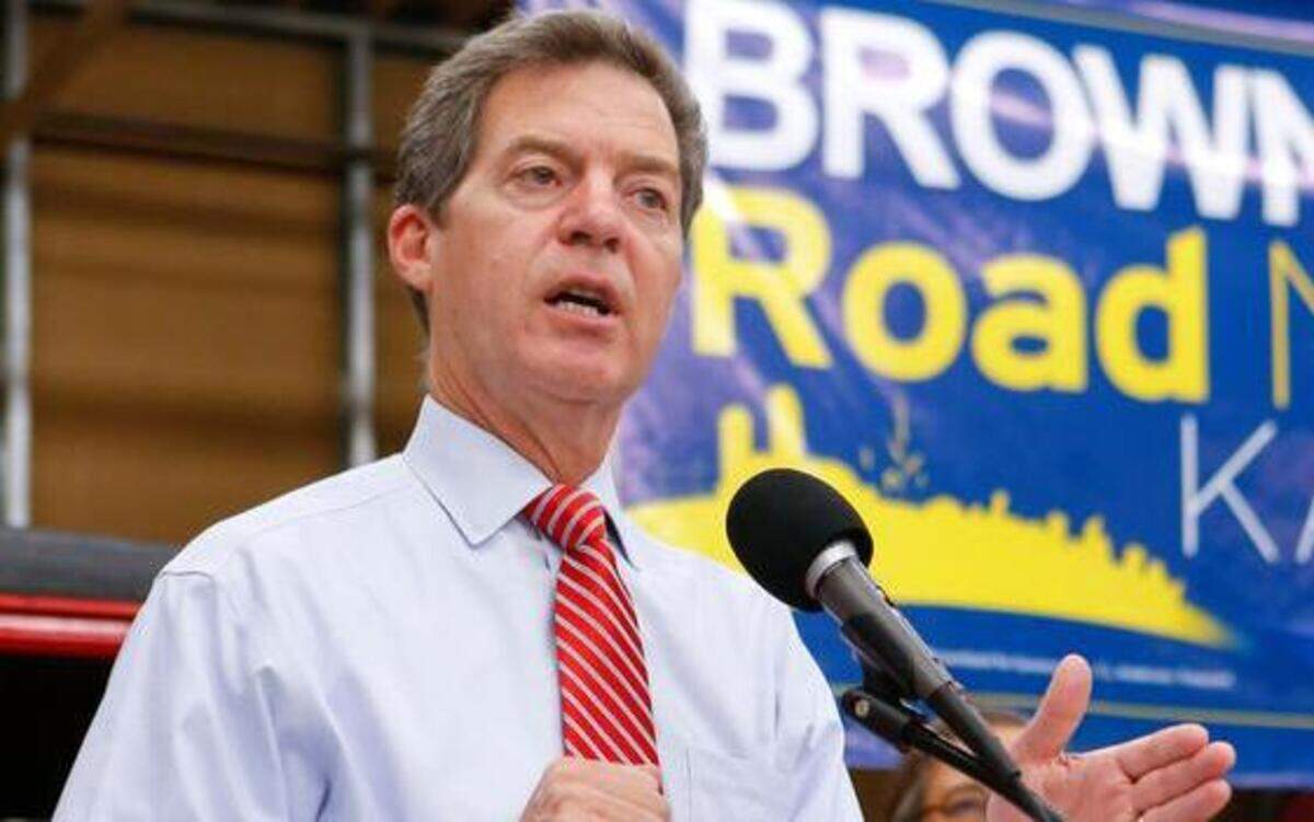 
Kansas Gov. Sam Brownback describes his plans on getting people to move to Kansas while speaking at rally on Tuesday, Aug. 12, 2014, at Capital City Oil in Topeka.
