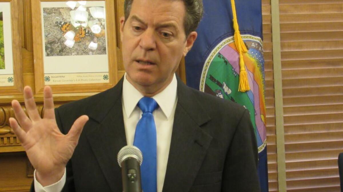 Kansas Gov. Sam Brownback says he’ll support Donald Trump’s presidential bid, but he’s hardly enthusiastic about backing his party’s presumptive nominee.