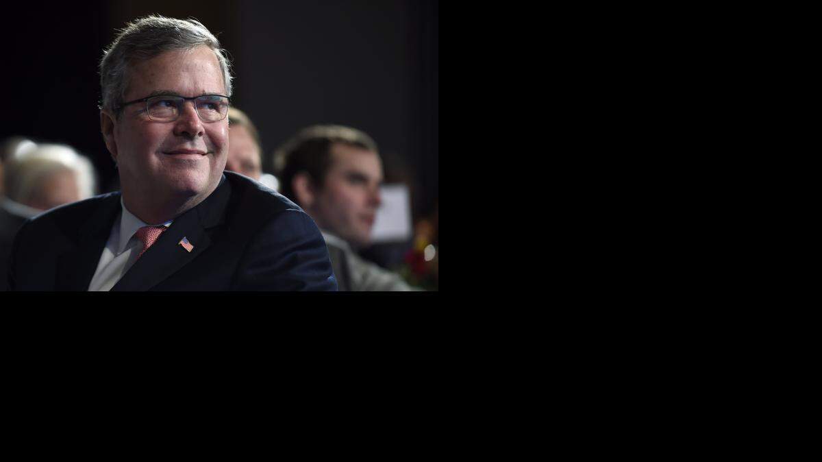 
In this Nov. 20, 2014 file photo, former Florida Gov. Jeb Bush listens before speaking at the National Summit on Education Reform in Washington. Bush on Tuesday took his most definitive step yet toward running for president, announcing plans to “actively explore” a campaign and form a new political operation allowing him to raise money for like-minded Republicans. 
